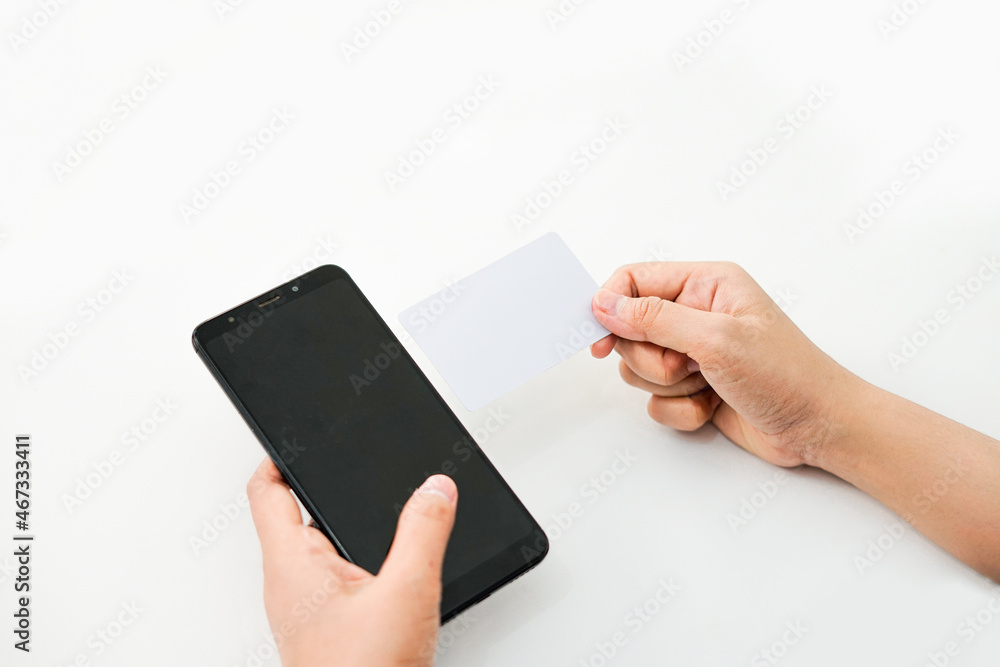 Poster hands are holding a phone in the left and an empty card in the right. a graphic resource for mockup.