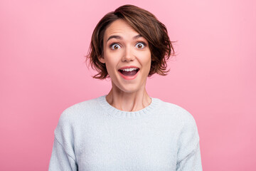 Photo of young amazed cool shocked positive woman sale news good mood isolated on pink color...