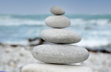 Naklejka na ściany i meble Stack of pebbles balancing, zen concept