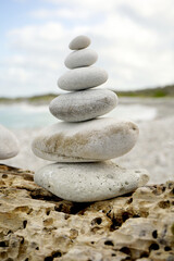Fototapeta na wymiar Stack of pebbles balancing, zen concept
