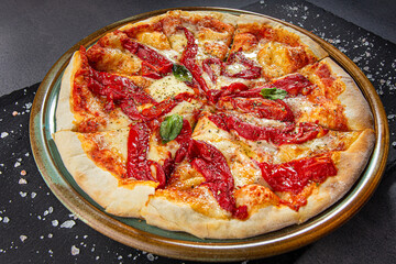 Pizza with smoked bell pepper, tomatoes and herbs