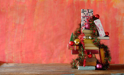 Giving books for christmas with christmas decoration.Reading,literature,education,gift,present,christian holiday concept, copy space