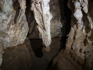 Biggest tuffa bathtub and one stalactite in Stopica cave on slopes of mountain Zlatibor in Serbia