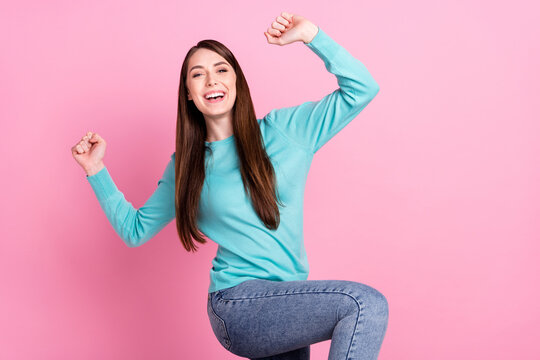 Portrait of attractive lucky cheerful girl dancing rejoicing having fun best isolated over pink pastel color background