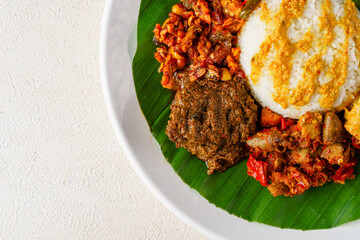 Beef Rendang or Nasi Rendang Sapi is a Minang dish originating from the Minangkabau region in West Sumatra, Indonesia. 

Beef Rendang is Popular food for breaking fast during Ramadan. Ramadan Food. 
