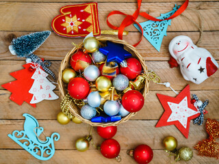 Christmas decorations on wooden background with advertising space
