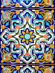 traditional Uzbek pattern on the ceramic tile on the wall of the mosque, abstract background