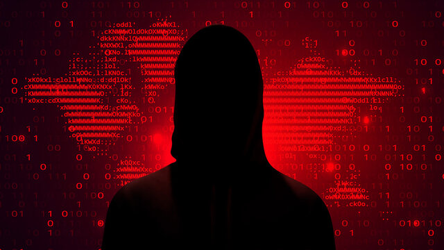 Computer hacker on abstract binary code background. Hacking concept