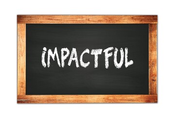 Obraz premium IMPACTFUL text written on wooden frame school blackboard.