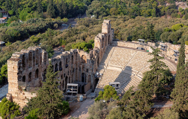 Aerial view of ancient Amphitheatre Odeon on a summer day in the Acropolis of Greece, Athens