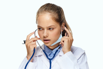 Fototapeta premium female laboratory assistant in white coat chemical solution analyzes research