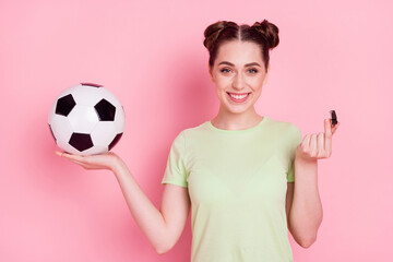 Photo of cheerful lovely coach lady hold soccer ball blow whistle wear green t-shirt isolated on...