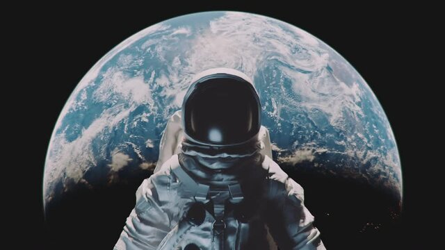 Zoom in shot of an astronaut with planet Earth in the background.