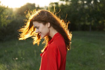 woman in red dress posing nature sun fun © VICHIZH