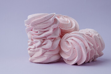pink homemade marshmallows on purple background