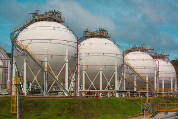White spherical propane tanks.