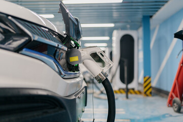 electric car charging in the station