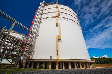Male climb the stairway ladder storage visual inspection tank
