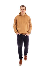 full length portrait of walking handsome man in beige hoodie isolated on white