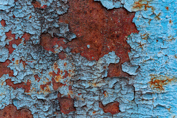Blue peeling paint and rust