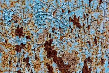 Blue peeling paint and rust