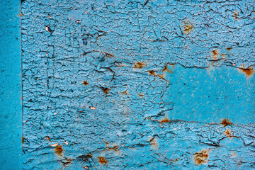 Blue peeling paint and rust
