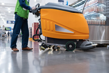 cleaning floor with machine

