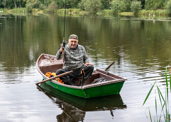 a fisherman in a boat, a small pike attached to the fisherman, a calm lake water surface, tree...