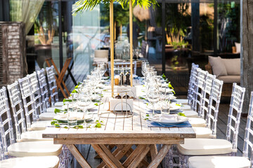 Table decoration before the festive feast. Decorating before the holiday. 