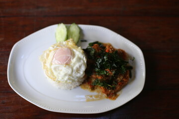 Stir Fried Basil with Crispy Chicken with Rice and Fried Egg