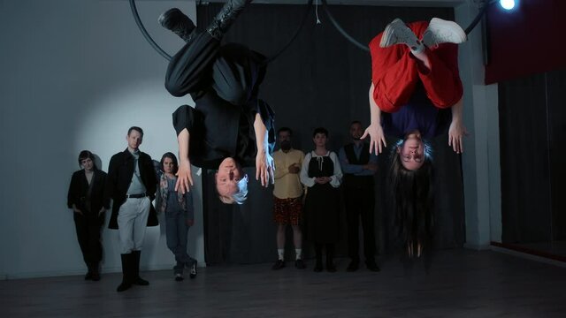 Video of group of people looking at performance