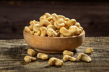 Cashew nuts in a wooden bowl