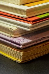 Stacks of children books piled on top of each other