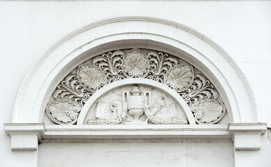 Semi circular architectural decoration on teacher house facade in Kyiv Ukraine