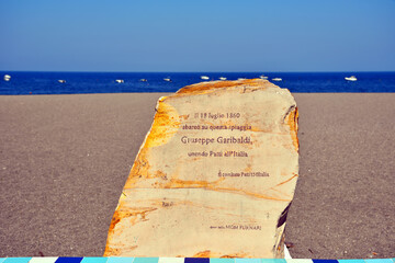 commemorative plaque in italian on 19 july 1860 giuseppe garibaldi landing on this island Patti...