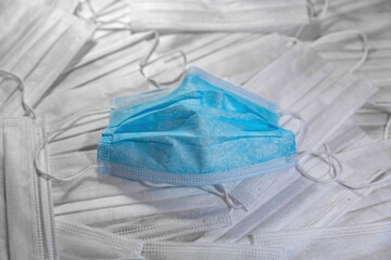 Non-sterile disposable medical mask with elastic bands. Made of non-woven materials. Multi - layered