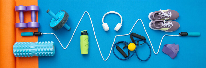still life of group sports equipment for womens and cardiogram of jump rope - obrazy, fototapety, plakaty