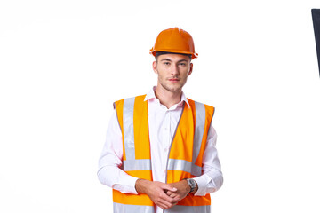 working man in orange uniform posing construction