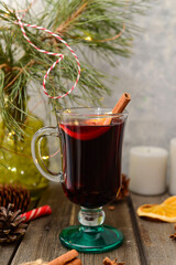 mulled wine on wooden background.