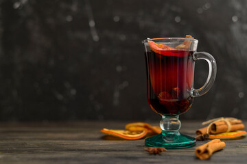 mulled wine on wooden background. Christmas drink. Horizontal view. Copy space.