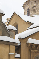 old church roof covered with snow