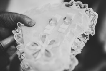 Wedding rings on ceremony at church. Macro.