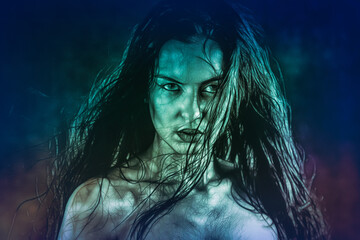 Close up portrait of a scary zombie woman.