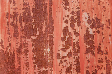 Red rusty iron sheet. Background. Space for text. Close-up.