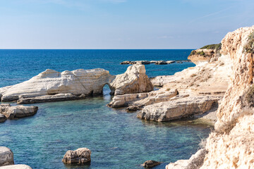 Fototapeta premium Rocks in the sea off the coast of Cyprus. Warm sea and picturesque coastal views in November.