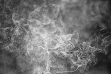white smoke on a dark background