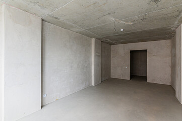 Russia, Moscow- May 04, 2020: interior room rough repair for self-finishing. interior decoration, bare walls of the premises, stage of construction