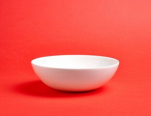 White bowl on colorful background