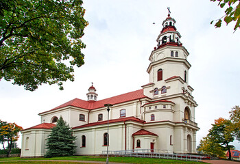 Fototapeta na wymiar General view and architectural details of the Baroque Catholic Church of Our Lady of Częstochowa built in 1931 in the town of Mońki in Podlasie, Poland.