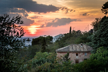 Sunset over a landscape of Recanati town with countryside. Recanati, Macerata, Marche, Italy